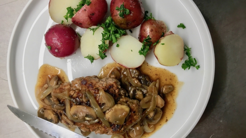 salisbury steak with mushroom gravy and potatoes