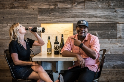Winemaker André Mack and Kiley Wynne Efron drink wine at Taverna San Marco in Jacksonville