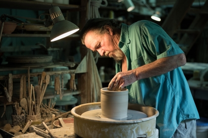 Bob Heim making pottery at Westside Studio