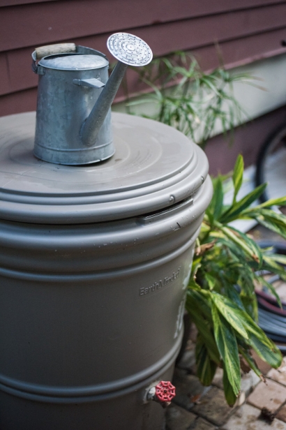 watering can and rain barrel