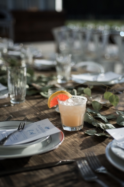 Manifest Cocktail on a farm table