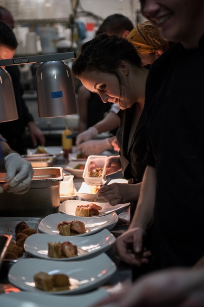 sous chefs on the line in a professional restaurant