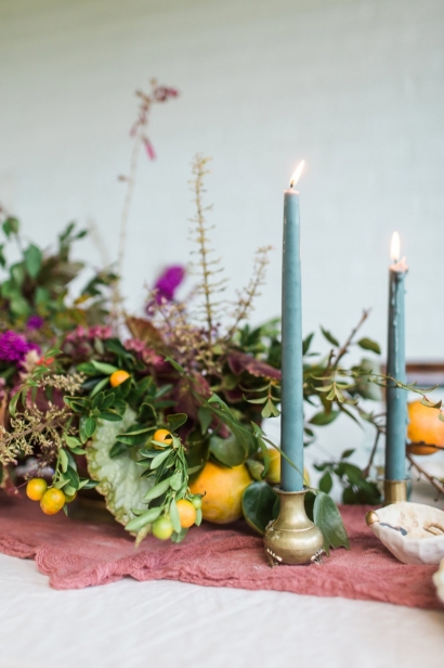 Foraged centerpiece and candles.