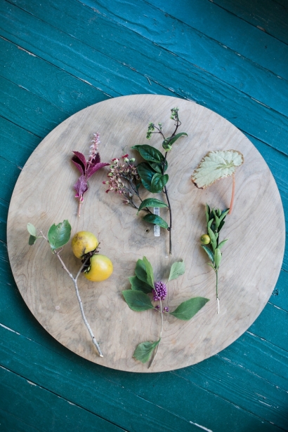 Foraged leaves and flowers on a platter
