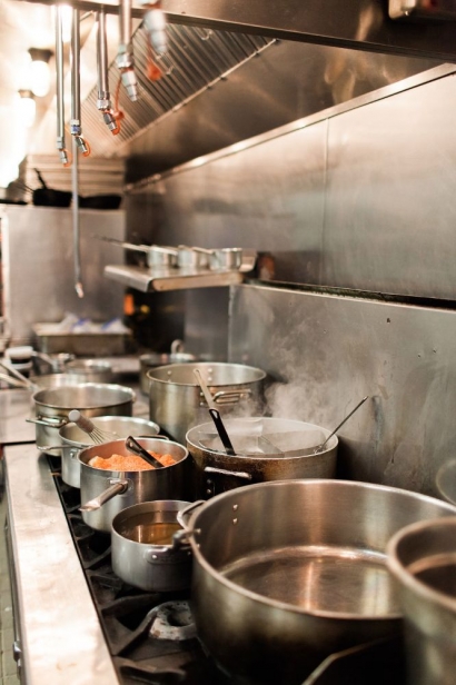the kitchen line of pots and pans at taverna san marco in jacksonville florida 