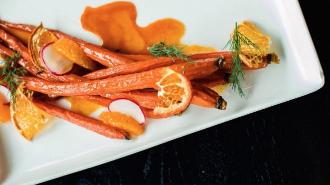 Sorghum Glazed Carrots close up on a plate
