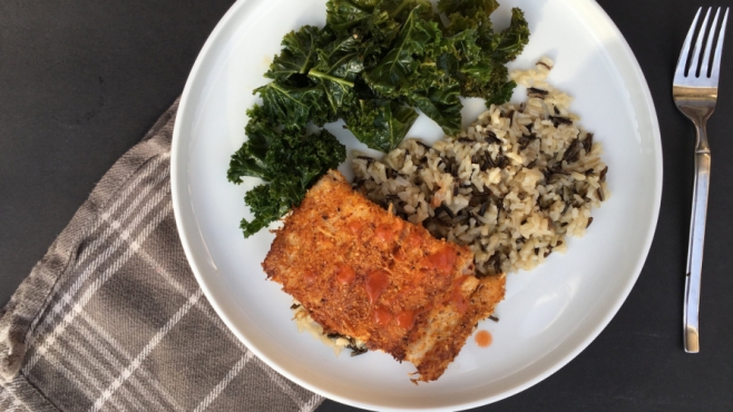 Parmesan Crusted Fish over Wild Rice with Mustard Greens
