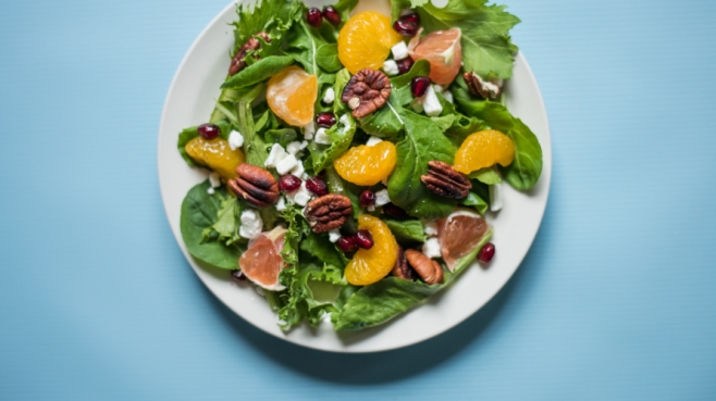 grapefruit salad on blue background