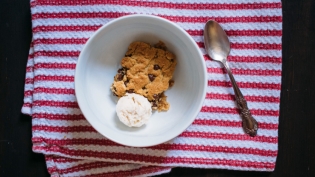 peanut butter blondie in bowl with ice cream